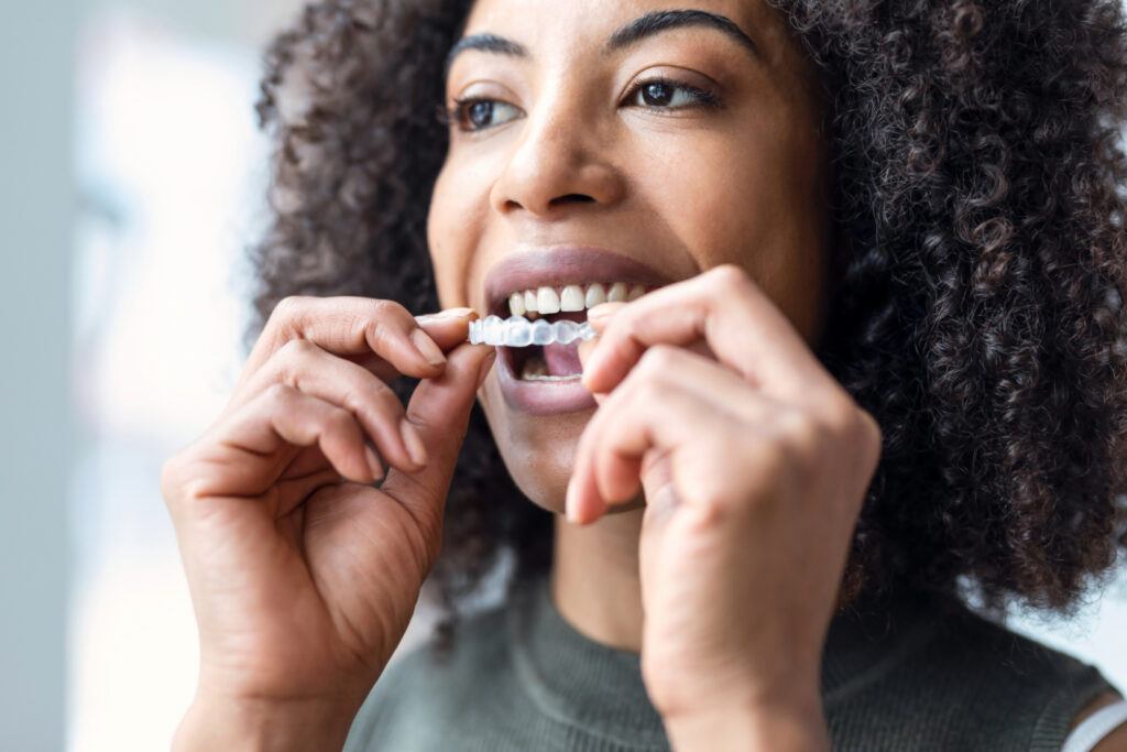 lady wearing Invisalign