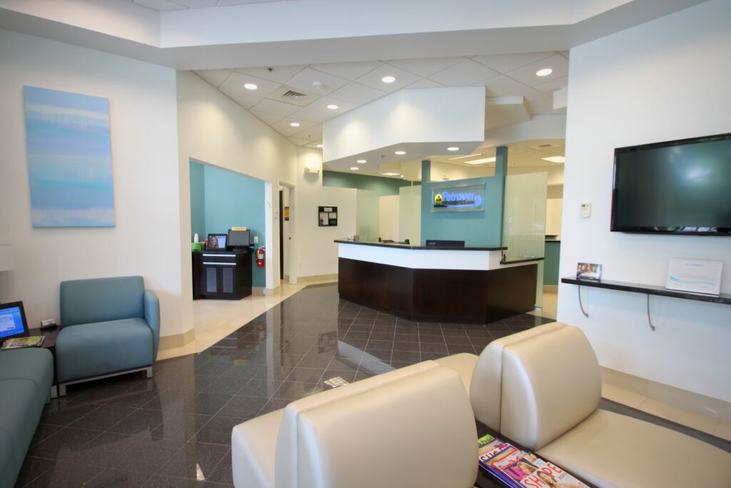 Reception desk and waiting area with seating